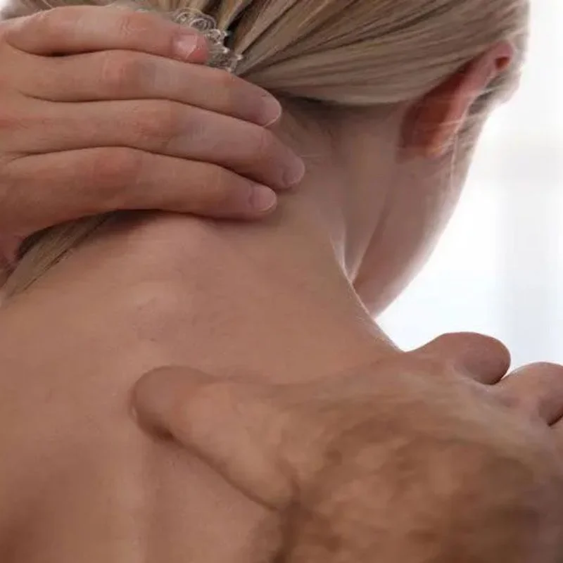 chiropractor performing manual therapy for neck pain relief in Whitby