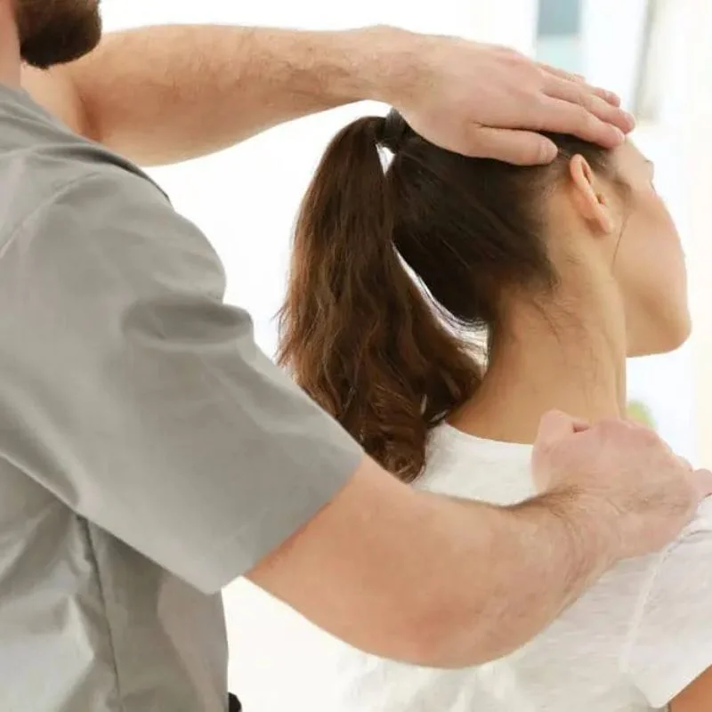 chiropractor treating whiplash injury with neck mobilization in Whitby