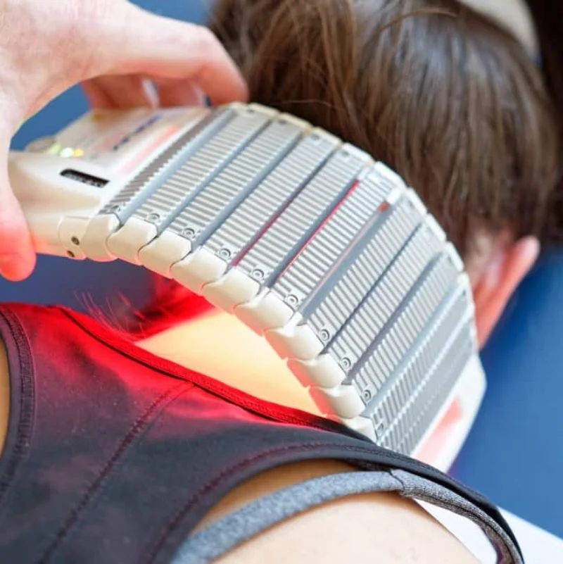 Bioflex laser therapy pad applied to patient neck for pain and inflammation relief in Whitby